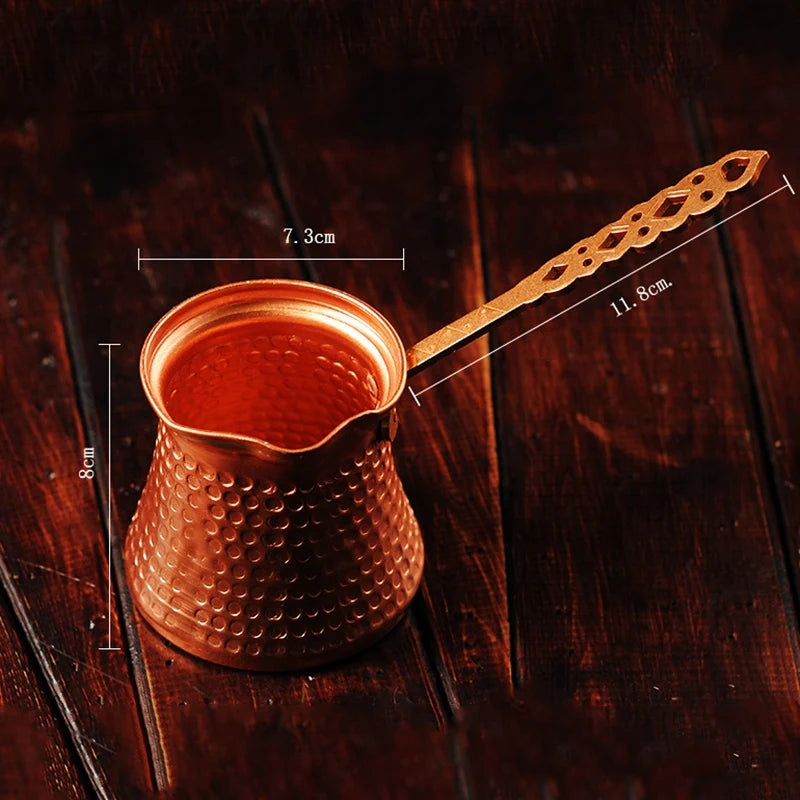 Copper Turkish Coffee Cezve with burnished patina and traditional spout design, displayed against neutral background