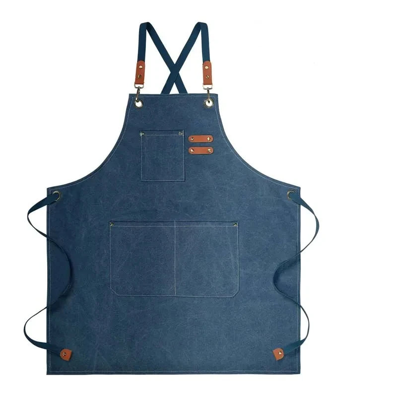 Waxed Canvas Barista Apron laid flat showing full front panel with leather straps and utility pockets