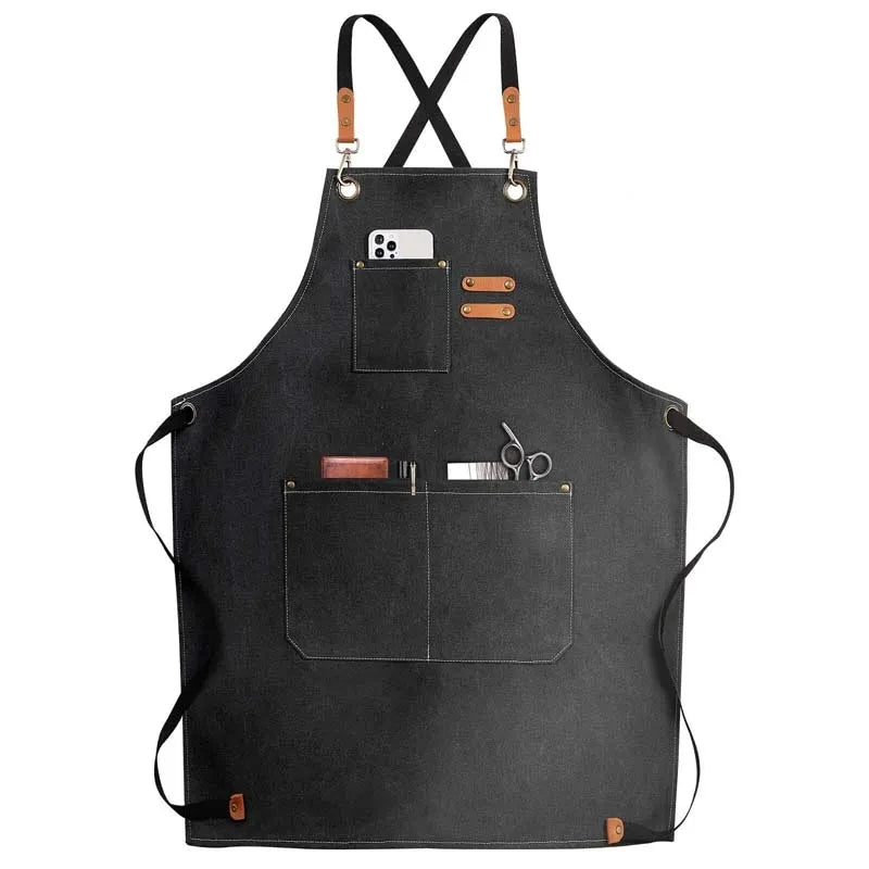 Waxed Canvas Barista Apron laid flat showing full front panel with leather straps and utility pockets