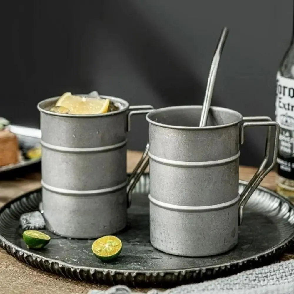 Stainless Steel Retro Camping Mug with Folding Handle displayed from above showing the 350ml capacity and handle mechanism