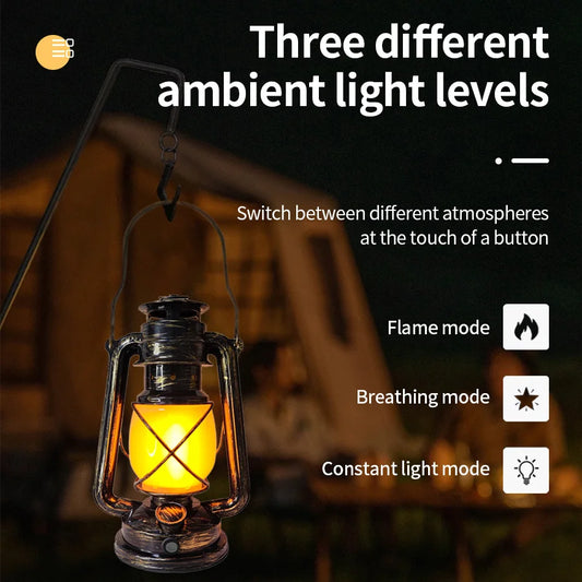 USB Rechargeable Retro Camp Lantern shown from side angle, brass-colored metal body with vintage design, camping accessory displayed against neutral background